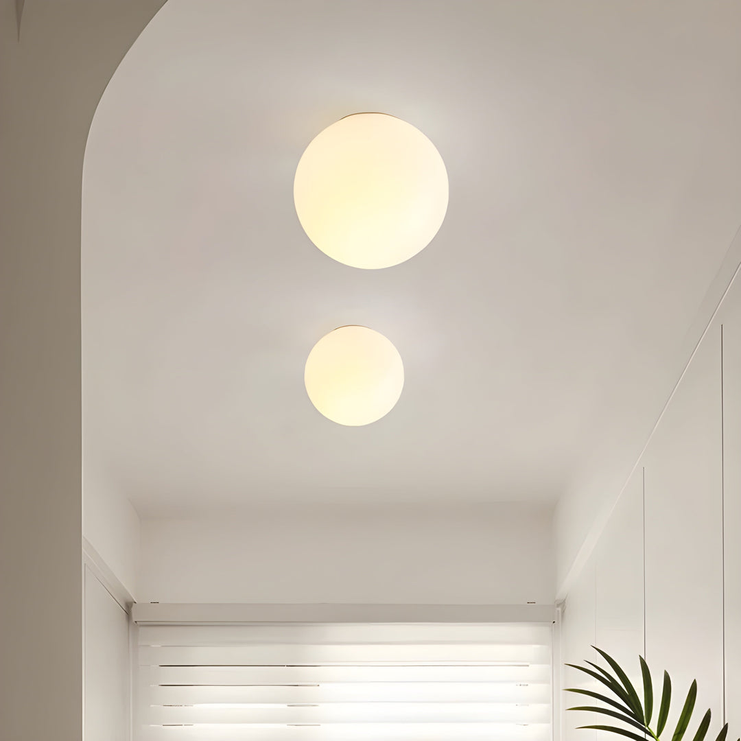 GlasAura Wall Lamp with Matte Glass Ball and Metal Base | Stornfield