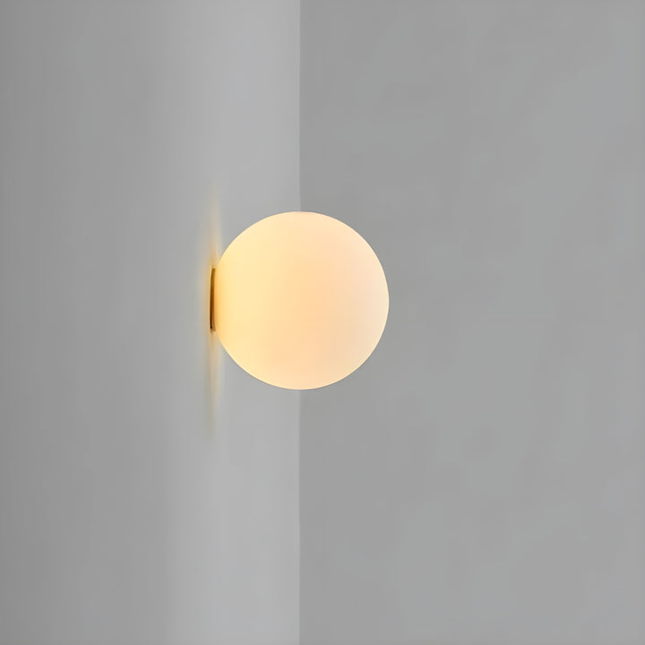 GlasAura Wall Lamp with Matte Glass Ball and Metal Base | Stornfield
