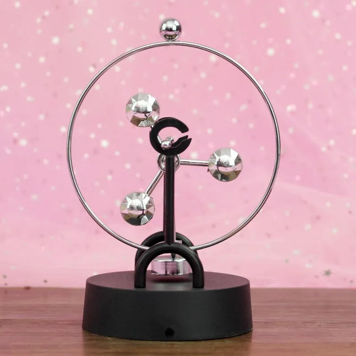 Stornfield | Newton's Cradle, which represents perpetual motion