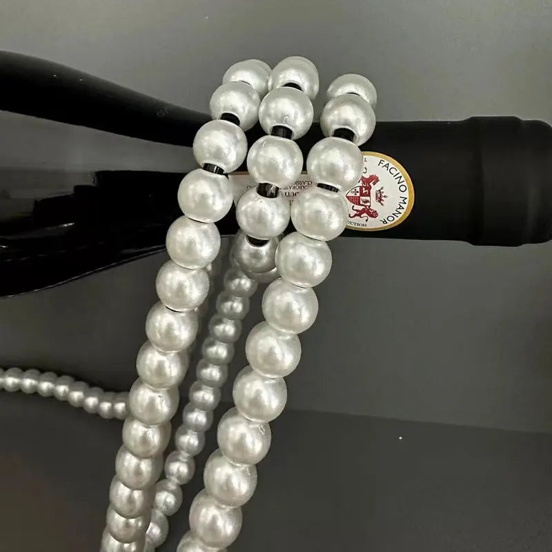 Stornfield | Floating Wine Racks in Beads