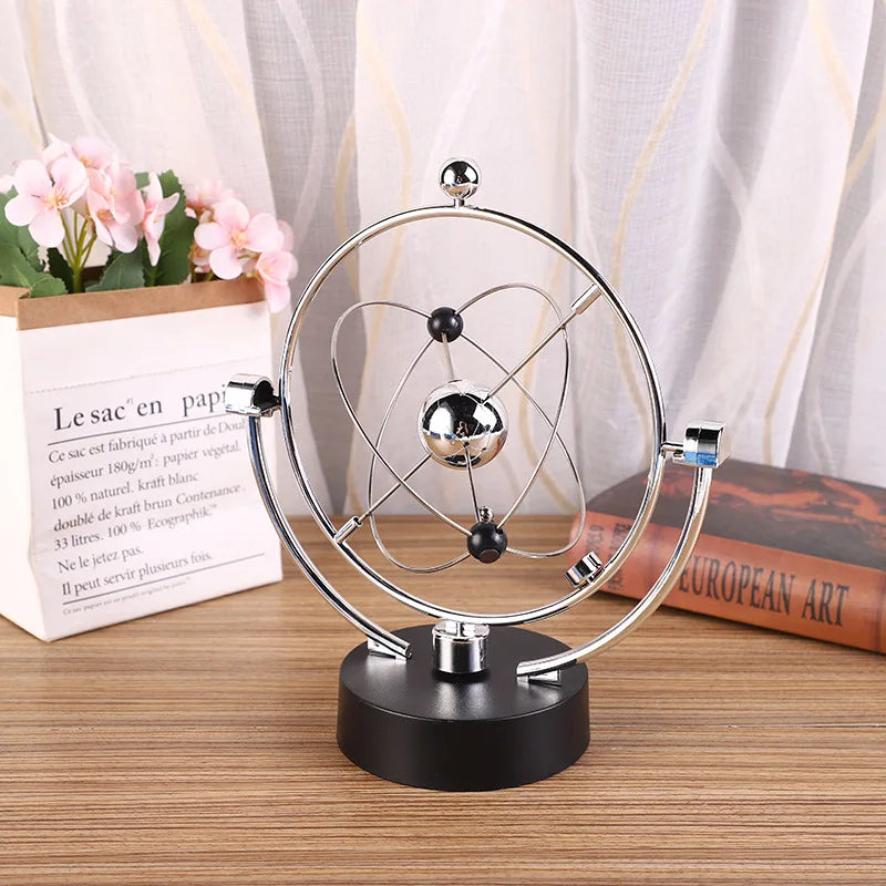 Stornfield | Newton's Cradle, which represents perpetual motion