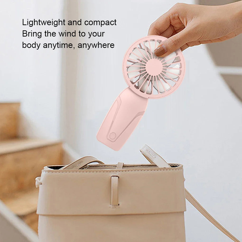 Portable Handheld Mini Fan – Lightweight ABS USB Rechargeable Pocket Fan for On-the-Go Cooling | Stornfield