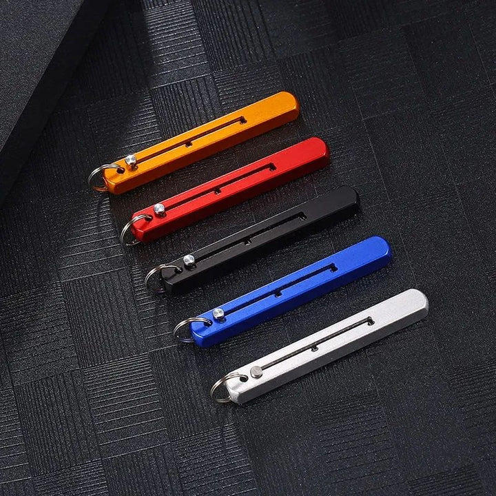 Compact Titanium Outdoor Defense Tool Keychain | Stornfield