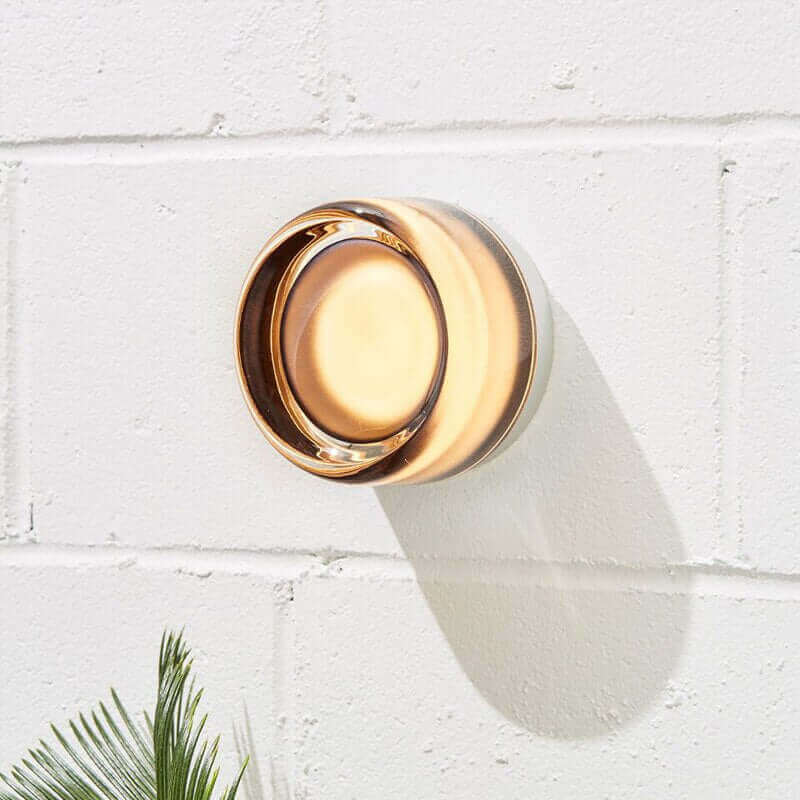 Stornfield | Unique and futuristic solid plexiglass wall lamp
