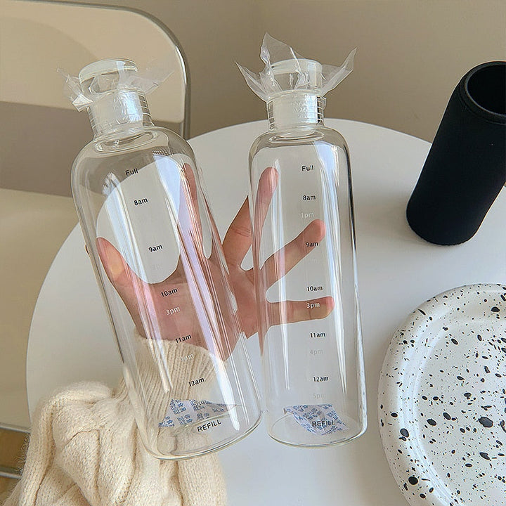 Stornfield | Heat-resistant Glass Water Bottle Time Scales