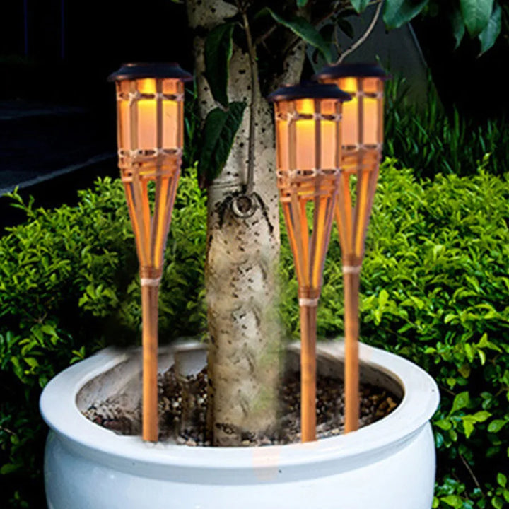 Solar-powered garden torches in bamboo design – Weatherproof LED decorative lighting for outdoors | Stornfield