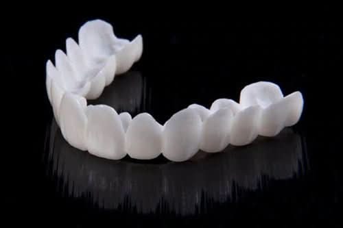 Stornfield | Dental prosthesis with white dental lenses