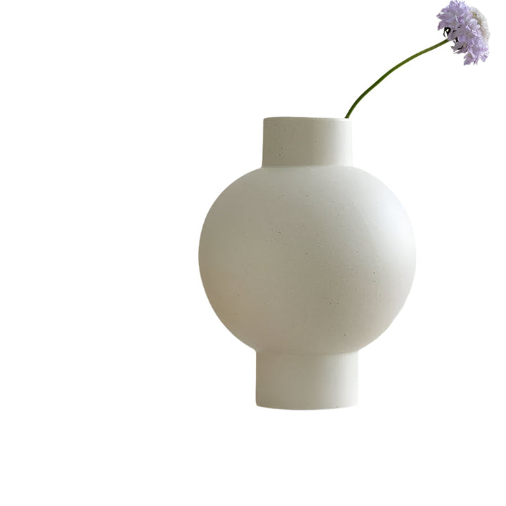 Elegant minimalist design with a curved, smooth Stornfield silhouette