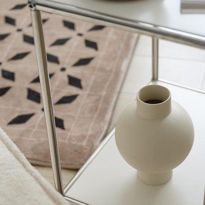 Elegant minimalist design with a curved, smooth Stornfield silhouette