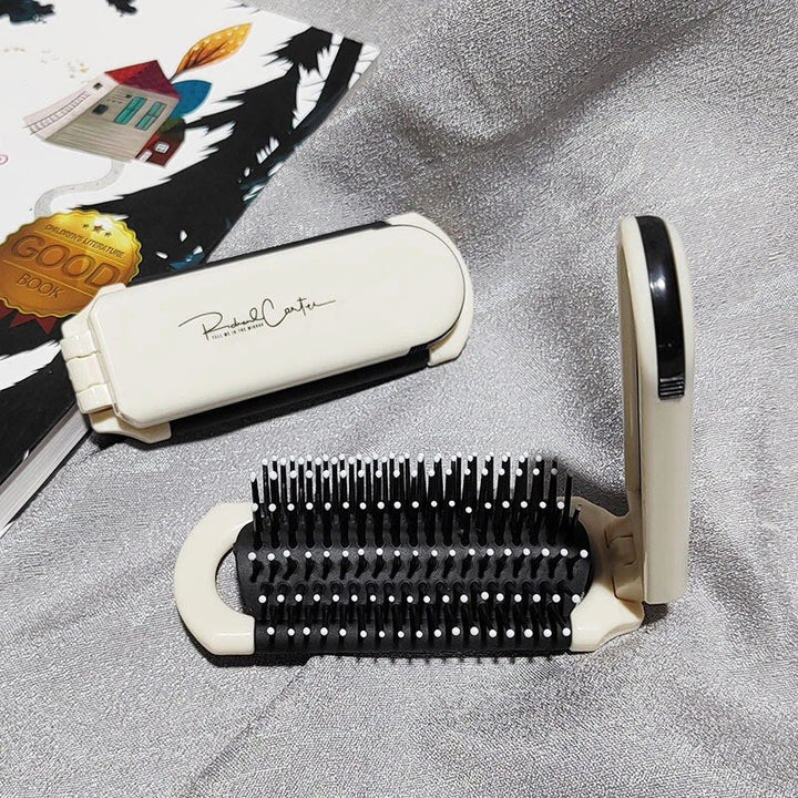 Compact hairbrush with integrated mirror | Stornfield