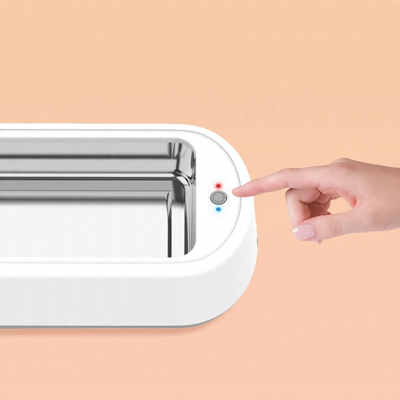 Ultrasonic eyewear cleaner with stainless steel