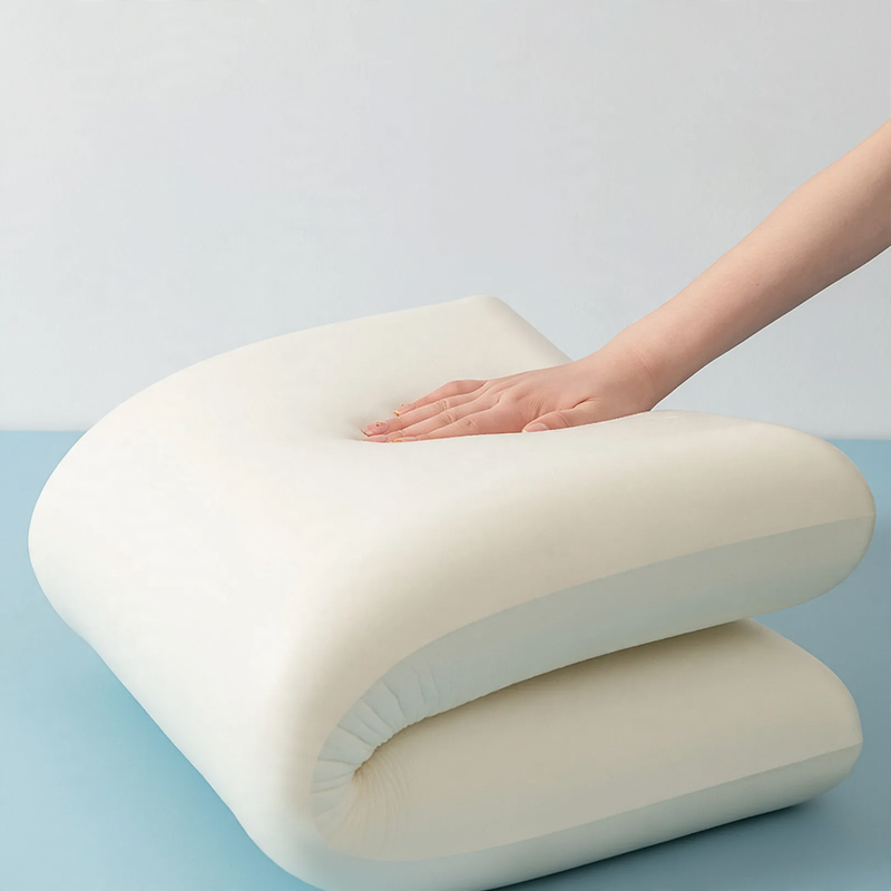 Ergonomic pillow with memory foam