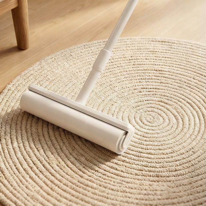 Lint roller with extendable handle