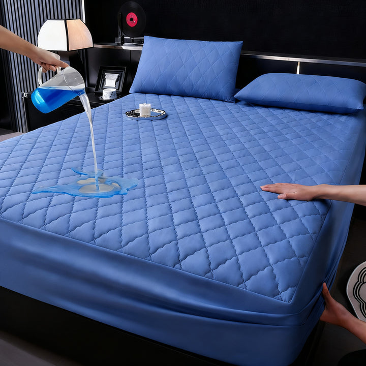 Waterproof fitted sheet with padding