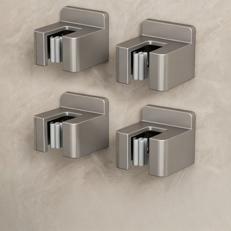Stainless steel wall holder for brooms and mops