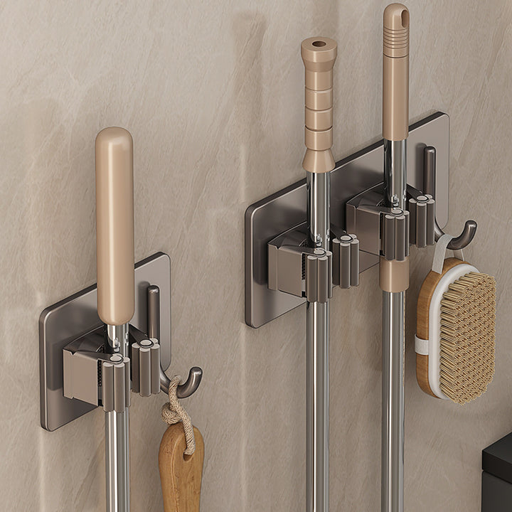 Stainless steel holder for mop and broom