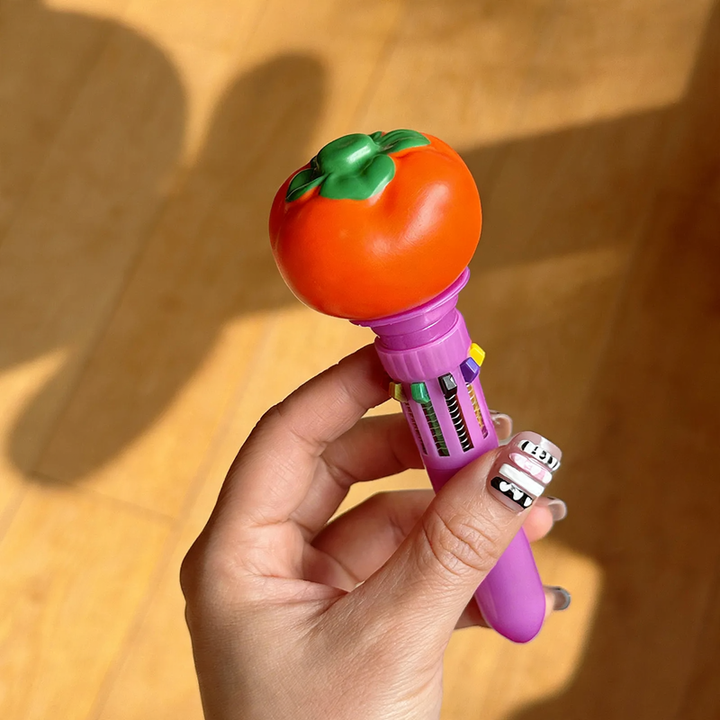 Multicolored ballpoint pen with food motifs
