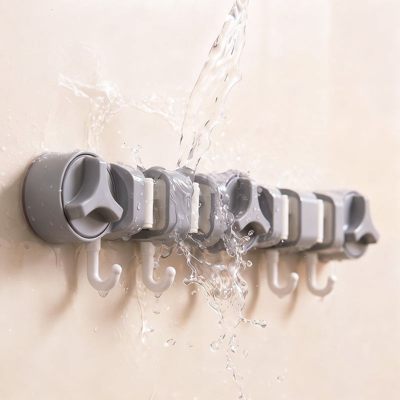 Suction cup holder for broom and mop