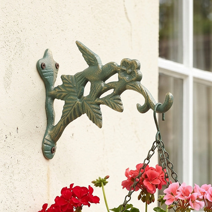 Cast iron wall hook with bird motif