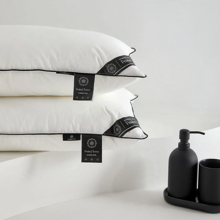 Down pillow with cotton cover, 48×74 cm