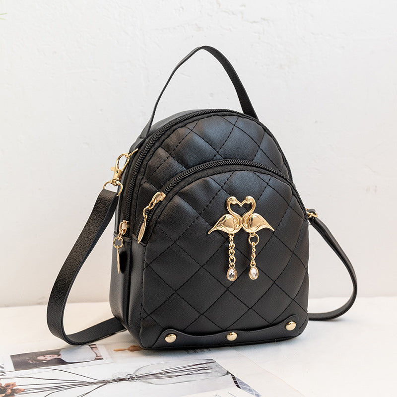 Embroidered backpack made of PU material