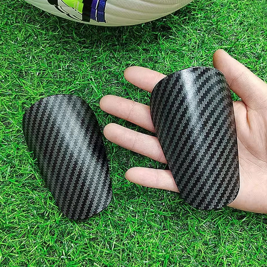 Plastic shin guards for ball sports