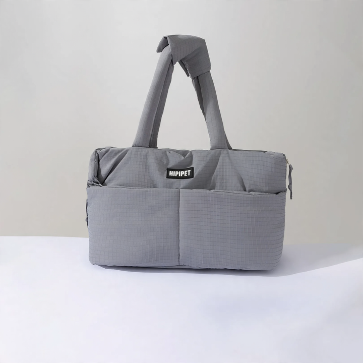 Portable pet carrier with sleeping mat