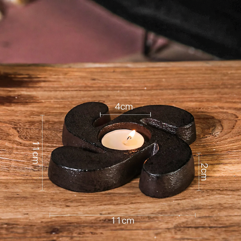 Cast iron candle holder, various designs