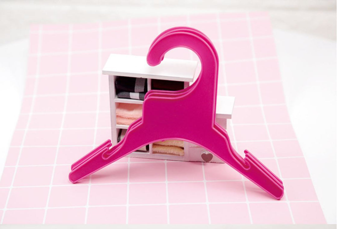 Plastic hanger for pet clothing