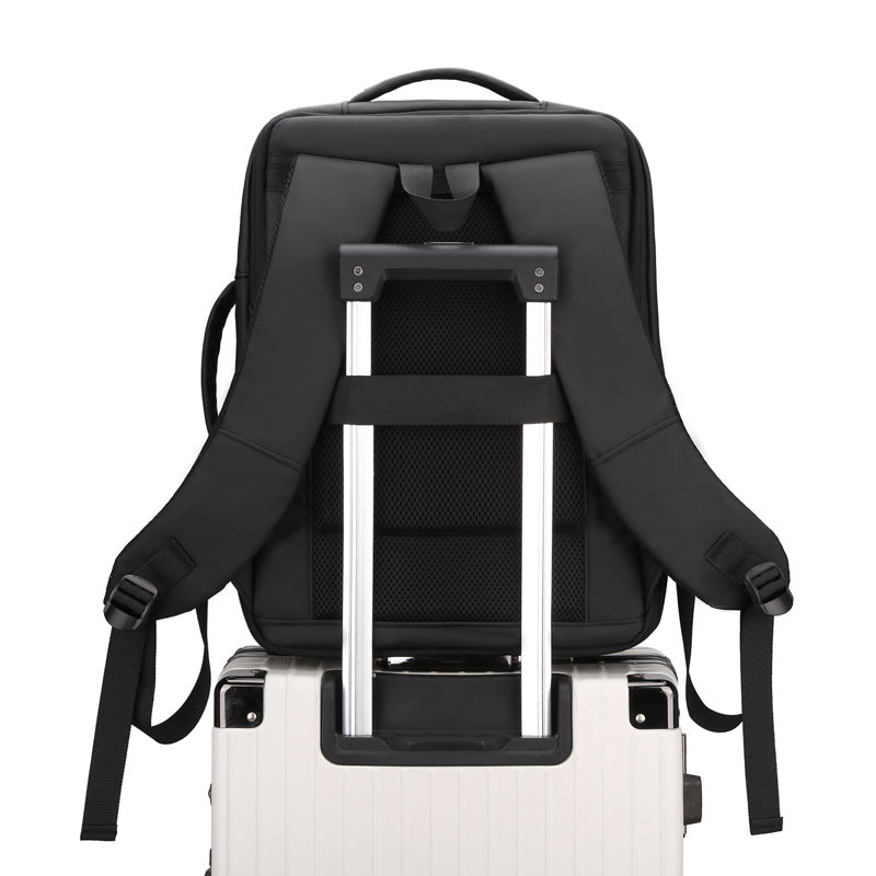 Expandable business backpack with USB charging, 20-35 L