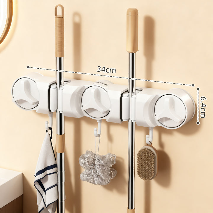Suction cup holder for broom and mop