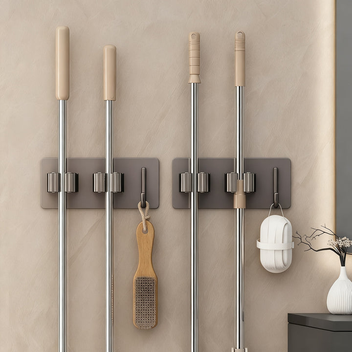 Stainless steel holder for mop and broom