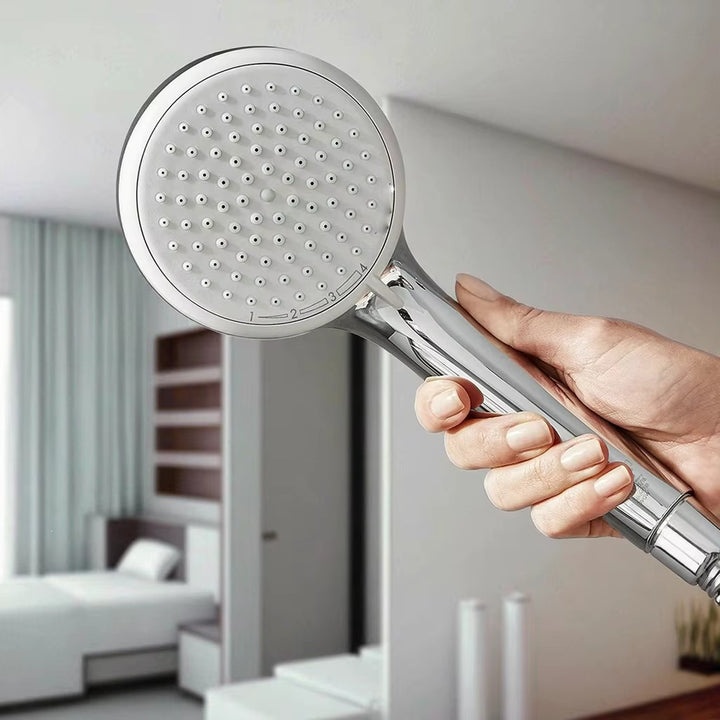 Faucet attachment with shower head and filtration