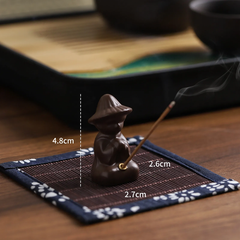Incense stick holder lotus leaf and fisherman, resin