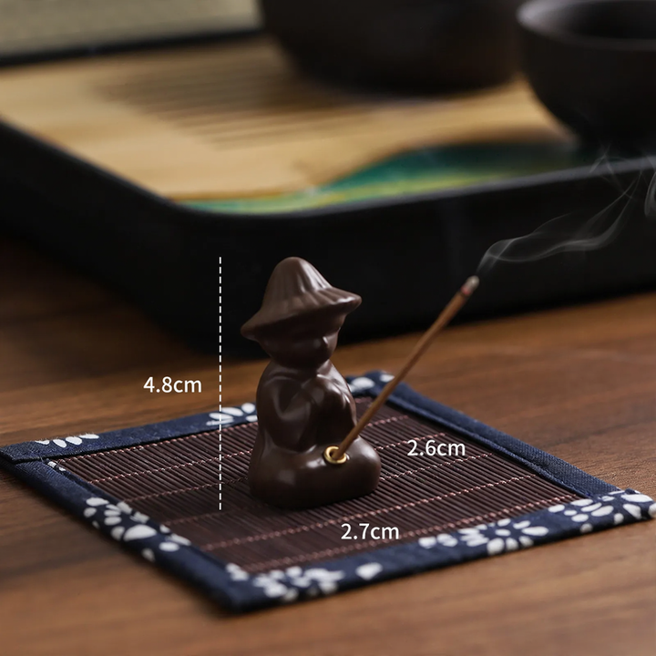 Incense stick holder lotus leaf and fisherman, resin