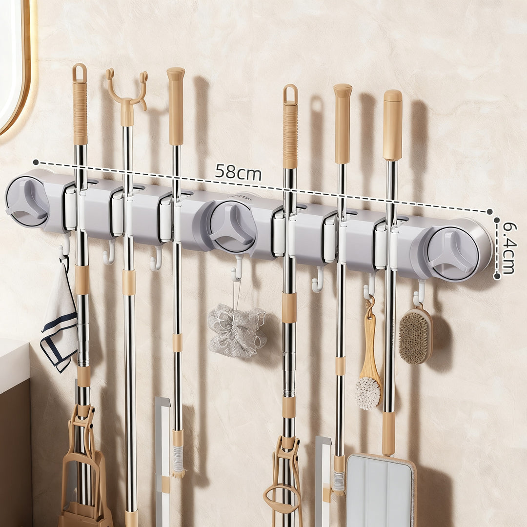 Suction cup holder for broom and mop