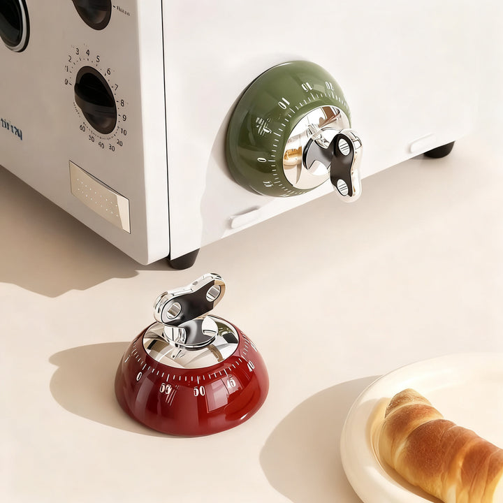 Mechanical kitchen timer with magnetic holder