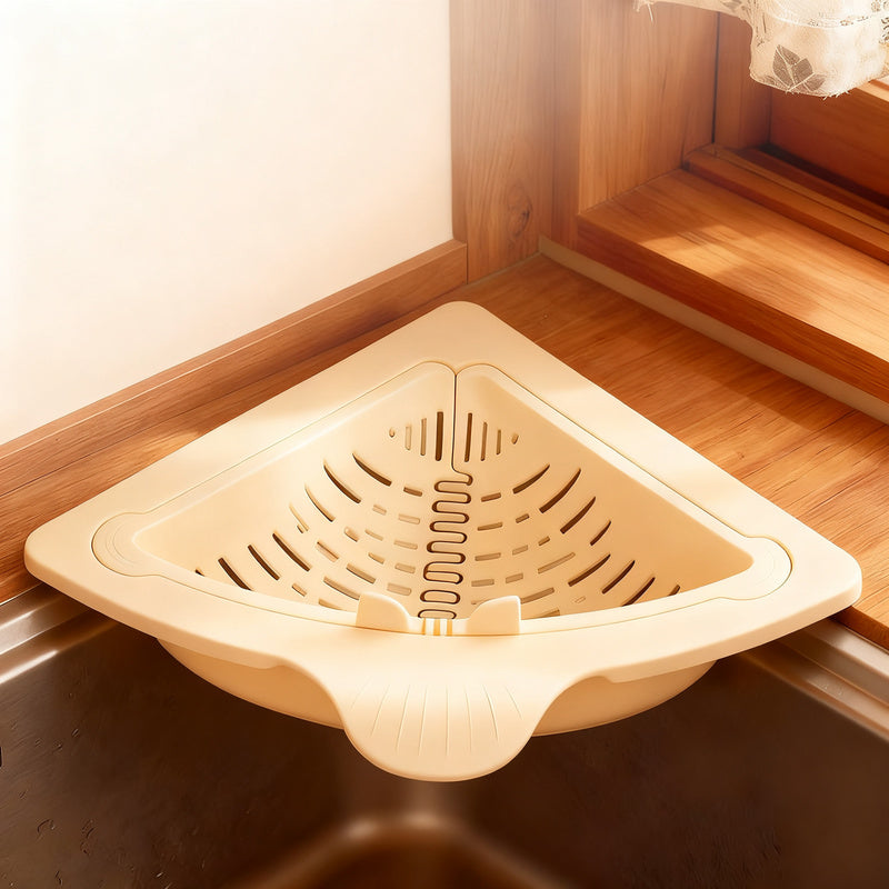 Kitchen sieve with magnetic attachment for the sink