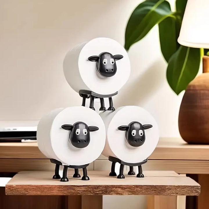 Toilet paper holder made of synthetic resin, sheep design