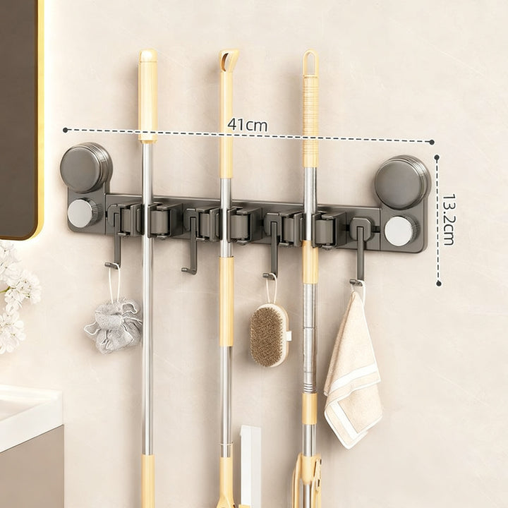 Suction cup wall holder for cleaning tools