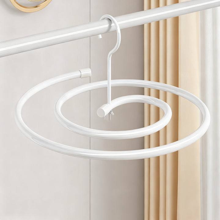 Clothes dryer spiral-shaped, round or oval