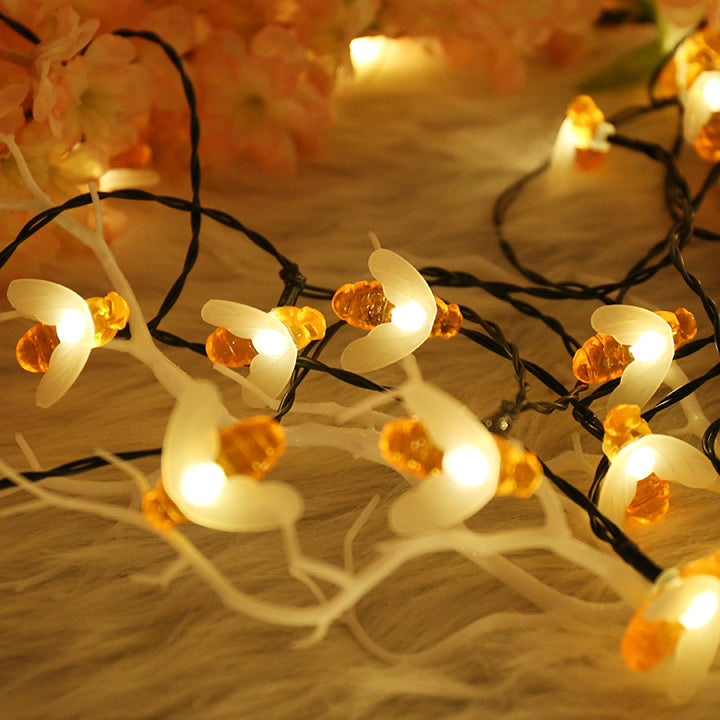 Solar string lights with bee motifs