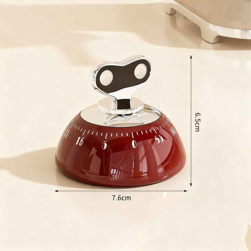 Mechanical kitchen timer with magnetic holder
