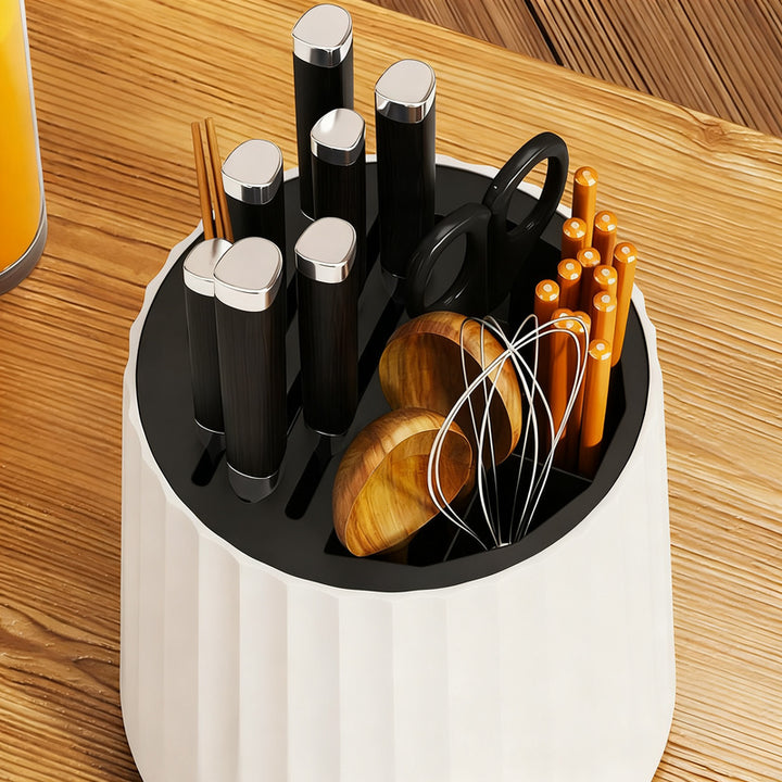 Rotating knife holder with cutlery compartment