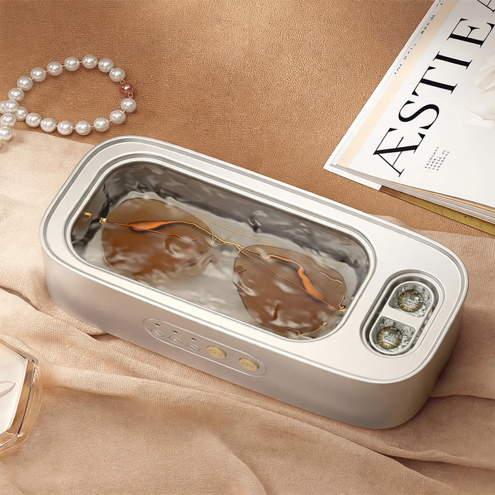 Ultrasonic eyeglass cleaner with double chamber