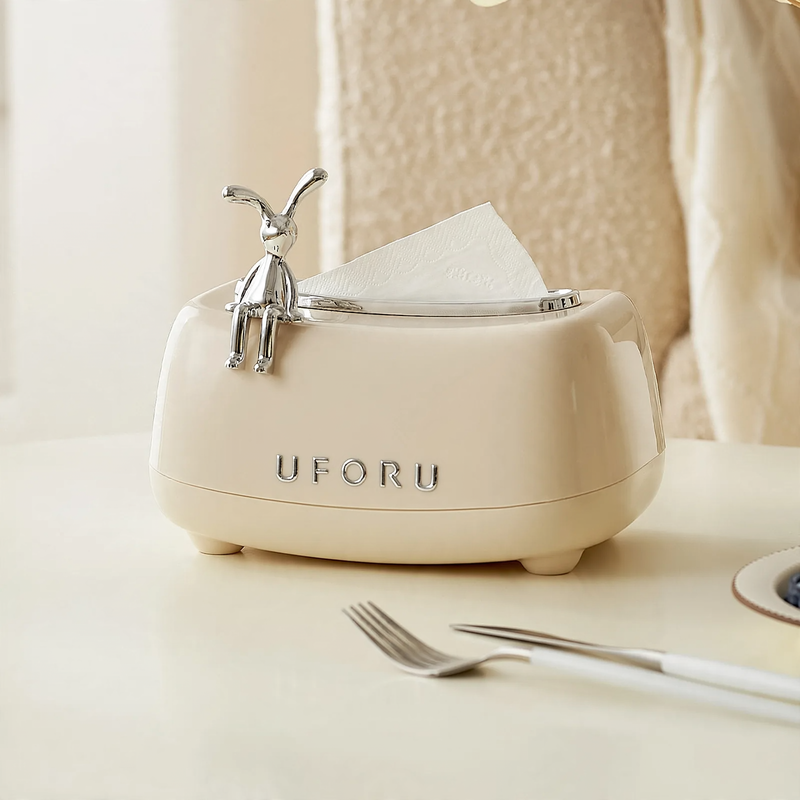 Tissue box with spring mechanism, waterproof
