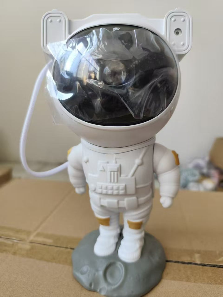 Star projector with astronaut design