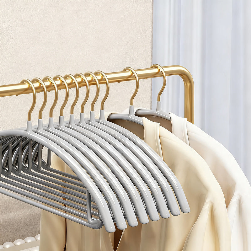 Plastic hanger with non-slip grip