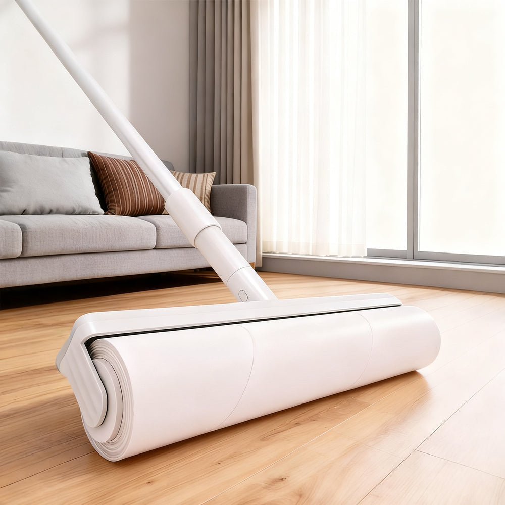 Lint roller with extendable handle