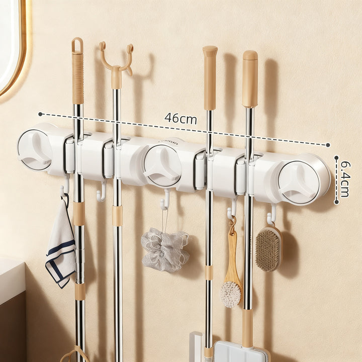 Suction cup holder for broom and mop